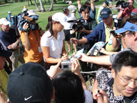 Michelle Wie signs autographs