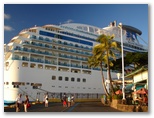 The Island Princess cruise ship waits to sail from Honolulu Harbor